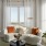 living room with cream couch and large windows